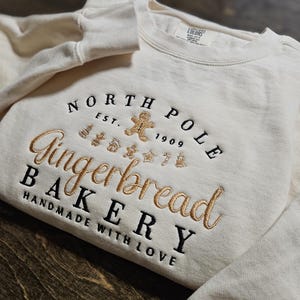 Christmas GINGERBREAD BAKERY crewneck sweatshirts, holiday sweater, christmas sweater, embroidered sweatshirt, gingerbread, Santa, gift