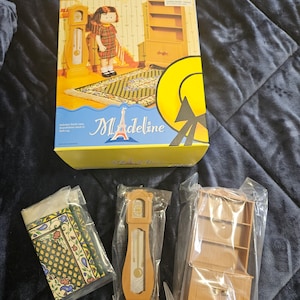 Madeline Livingroom Book case, Grandfather Clock and Soft Rug
