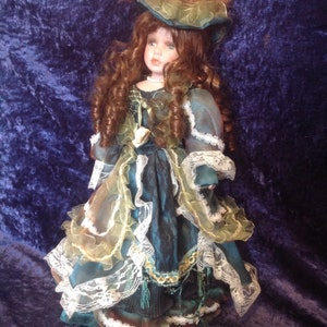 leonardo collection porcelain doll olivia