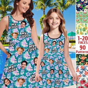 May include: Two sleeveless dresses with a tropical floral pattern featuring multiple faces. The dresses are teal green with pink and white flowers. The text "My Love" is repeated throughout the pattern.