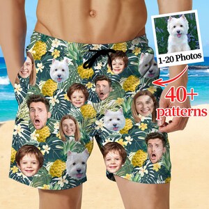 May include: Green and yellow tropical print swim trunks with faces of people and dogs. The trunks have a black drawstring and the text "40+ patterns" and "1-20 Photos" on a small image of a dog.