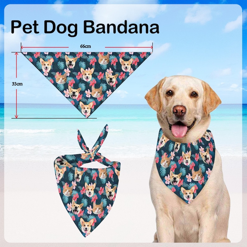 May include: A blue and pink dog bandana with a floral pattern and a dog's face repeated throughout the design. The bandana is 66 cm wide and 33 cm tall. A dog is wearing the bandana around its neck.