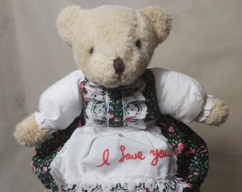 Small mohair teddy bear in dress and apron. Vintage mohair teddy bear girl I love you