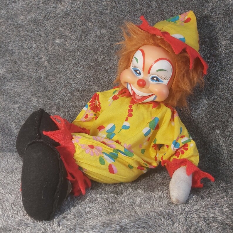 Vintage Rushton clown. Rubber face clown stuffed scary doll buffoon rubber face. Grotesque clown vintage creepy clown doll. Vintage Clown Rushton Star Creation stuffed creepy doll. Rushton creepy buffoon vintage. Scary clown stuffed doll vintage.