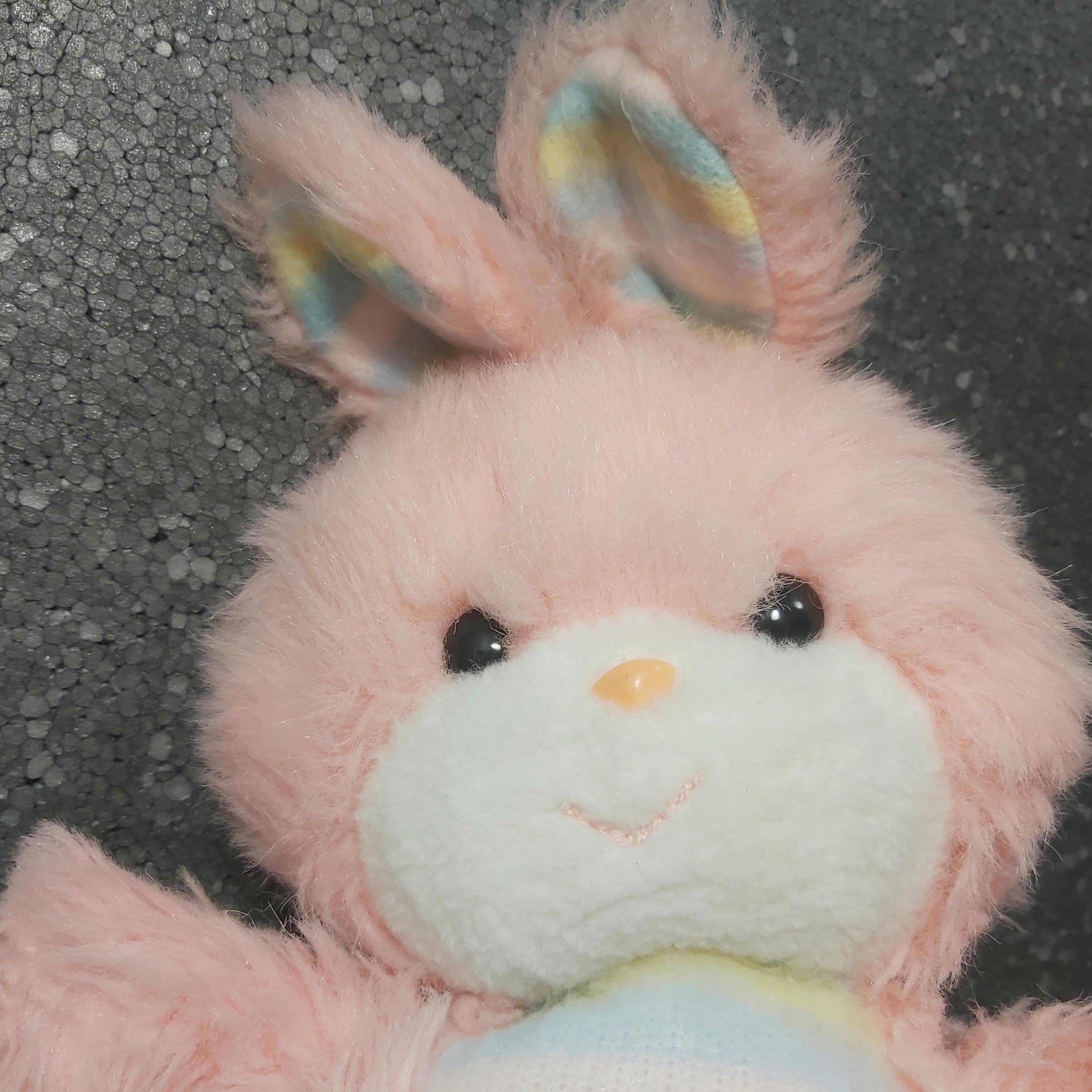 ヴィンテージのウサギのぬいぐるみ。ヴィンテージのピンクのウサギの