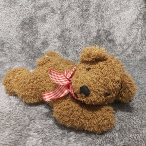 Vintage plush bear Die Spiegelburg. Vintage plush teddy bear Die Spiegelburg Museum Collection. Lying teddy bear Spiegelburg