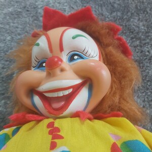 Vintage Rushton clown. Rubber face clown stuffed scary doll buffoon rubber face. Grotesque clown vintage creepy clown doll. Vintage Clown Rushton Star Creation stuffed creepy doll. Rushton creepy buffoon vintage. Scary clown stuffed doll vintage.