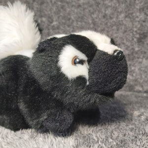 Skunk plush. Striped skunk stuffed animal. Striped skunk plush. Mephitis stuffed animal