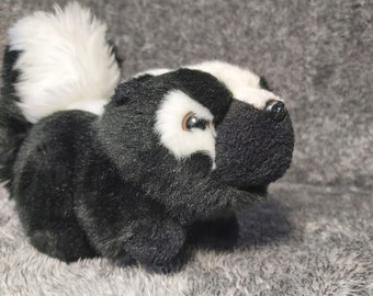 Skunk plush. Striped skunk stuffed animal. Striped skunk plush. Mephitis stuffed animal
