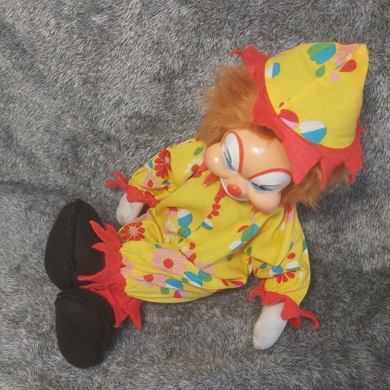 Vintage Rushton clown. Rubber face clown stuffed scary doll buffoon rubber face. Grotesque clown vintage creepy clown doll. Vintage Clown Rushton Star Creation stuffed creepy doll. Rushton creepy buffoon vintage. Scary clown stuffed doll vintage.
