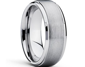 May include: A brushed silver tungsten carbide ring with a beveled edge.