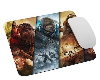 May include: A rectangular mouse mat with a vibrant video game design. The artwork is split into vertical sections, showcasing characters and scenes from different games. A white wireless mouse sits on the right, ready for use.
