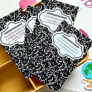 May include: Four composition books with black and white notebook paper covers. Each book has a different Bible verse printed on the front. The books are arranged in a yellow plastic container.