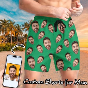 May include: Green swim trunks with a repeating pattern of a person's face. The text "Custom Shorts for Man" is at the bottom of the image.