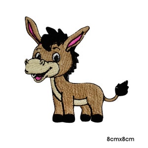 May include: Embroidered patch featuring a cartoon donkey in shades of brown, black, and pink. The donkey has a smiling expression and is approximately 3 inches by 3 inches in size. The patch is designed for application on clothing or accessories.