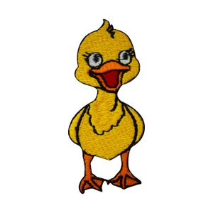 May include: Embroidered patch of a yellow cartoon duckling with a black outline. The duckling has large eyes with eyelashes, an orange beak, and orange feet. The duckling is smiling with a red mouth.