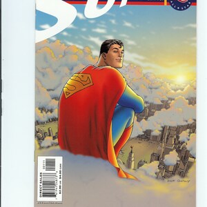 May include: Superman comic book cover featuring a red, blue, and yellow Superman logo. The cover art shows Superman sitting on a cloud, looking out over a city skyline. The text on the cover reads "Superman" and "Jan. No. 1".