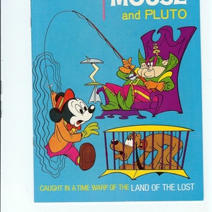 May include: A vintage comic book cover featuring Mickey Mouse and Pluto. The cover is blue with a yellow title and text that reads "Mickey Mouse and Pluto" and "Caught in a Time Warp of the Land of the Lost". Mickey Mouse is wearing a red hat and orange jacket. Pluto is in a cage.