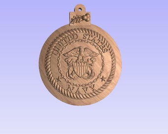 May include: Wooden Christmas ornament featuring the United States Navy emblem. The ornament is round with a rope-like border and the words "UNITED STATES NAVY" carved around the emblem. A small holly and berry design is at the top.