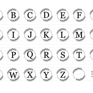 May include: A set of 26 alphabet letters in black, each surrounded by a black wreath. A blank wreath is also included.