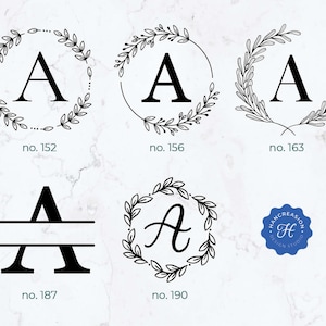 May include: Five different black and white monogram designs featuring the letter "A" in various styles. The designs include a wreath, a split monogram, and a handwritten script. The designs are numbered 152, 156, 163, 187, and 190.