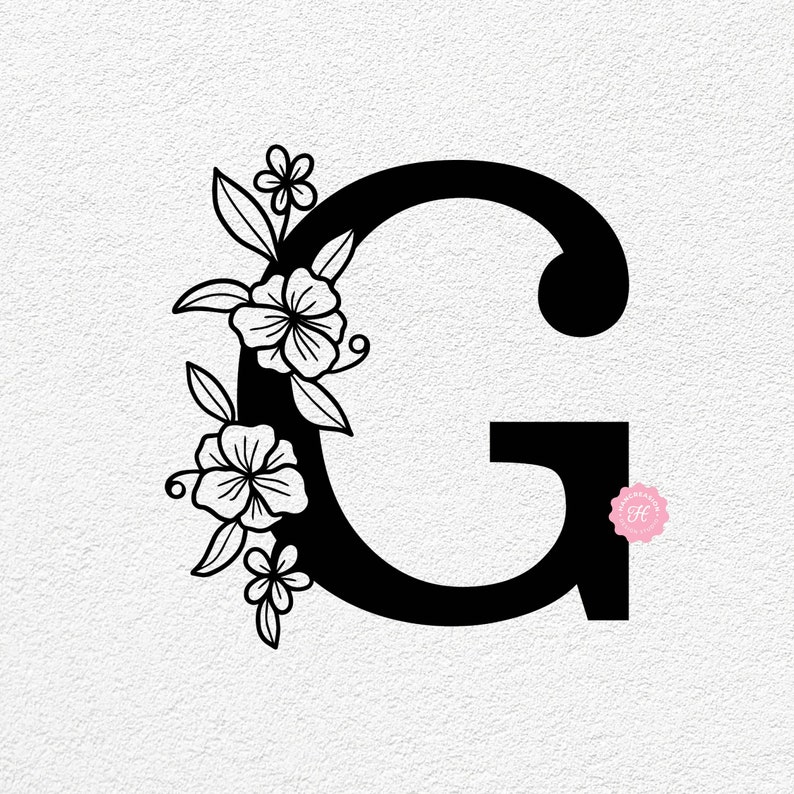 K&ouml;nnte beinhalten: Schwarz-wei&szlig;es Blumenmuster mit dem Buchstaben G mit stilisierten Blumen und Bl&auml;ttern.