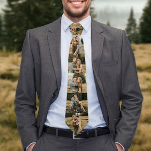 May include: A patterned tie featuring a series of photos of a couple in various poses. The photos are arranged vertically on the tie, creating a unique and personalized design.