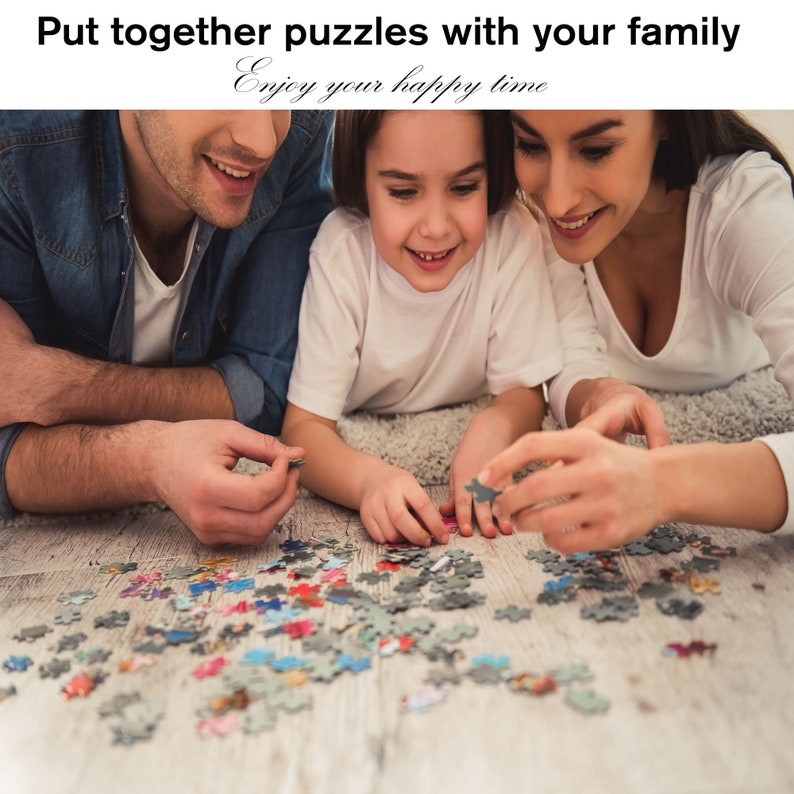 May include: A family of three, a parent, a parent, and a child, are working together on a colorful jigsaw puzzle on the floor. The text "Put together puzzles with your family Enjoy your happy time" is at the top of the image.