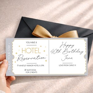 May include: A gray and white hotel reservation ticket with gold accents. The ticket reads "Hotel Reservation" and "Happy 40th Birthday Jana." The ticket is for Whatley Manor Hotel & Spa for two nights.