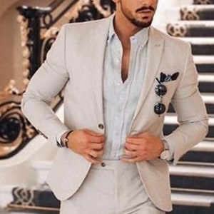 Trajes blancos para novio shop