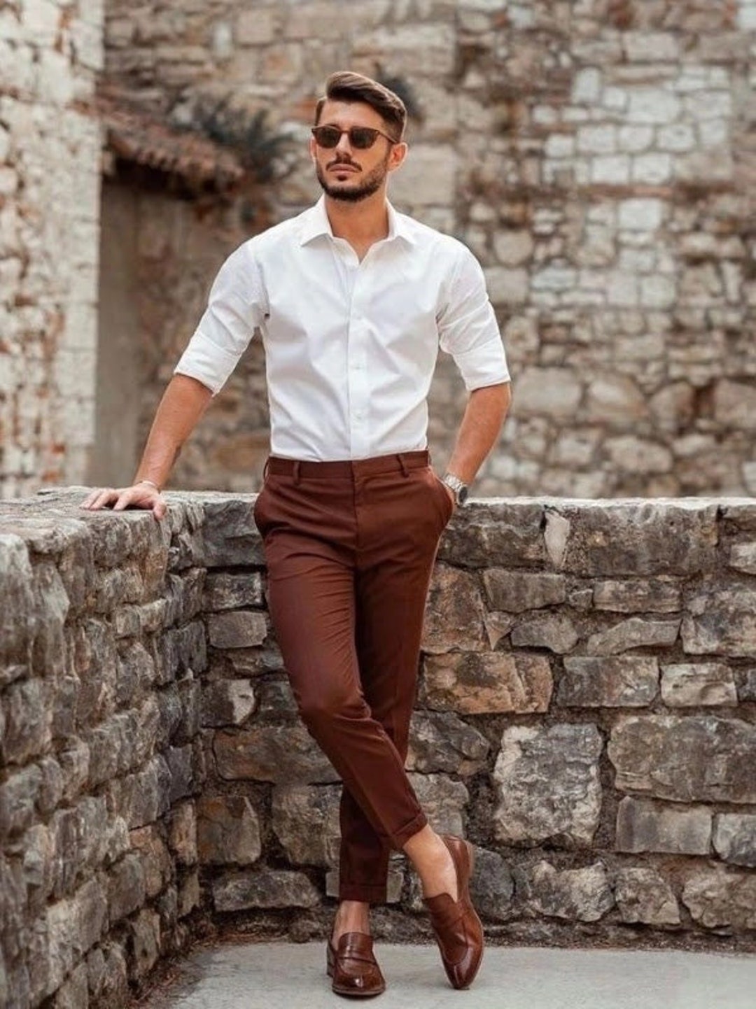 Premium AI Image | arafed man in a white shirt and brown pants standing in  a narrow alleyway generative ai