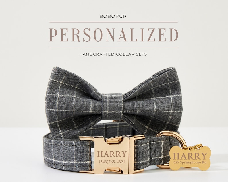 May include: A gray and white plaid dog collar and bow tie set with gold hardware. The collar has a personalized name tag that reads "HARRY (543) 765-4321". The matching bow tie is tied with a gold ribbon. The set also includes a gold bone-shaped tag with the name "HARRY" and the address "625 Springhouse Rd."