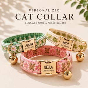 May include: Three personalised cat collars featuring floral embroidery in green, cream, and pink. Each collar has a gold-tone metal buckle engraved with a name and phone number, including LUNA, MILO, and BELLA, plus a small gold-tone bell attached.