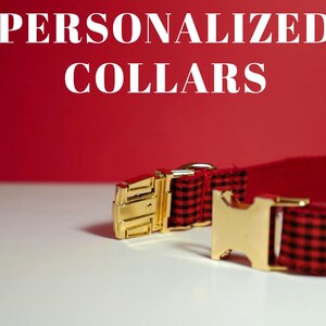 May include: Personalized red and black plaid dog collar with a gold metal buckle.