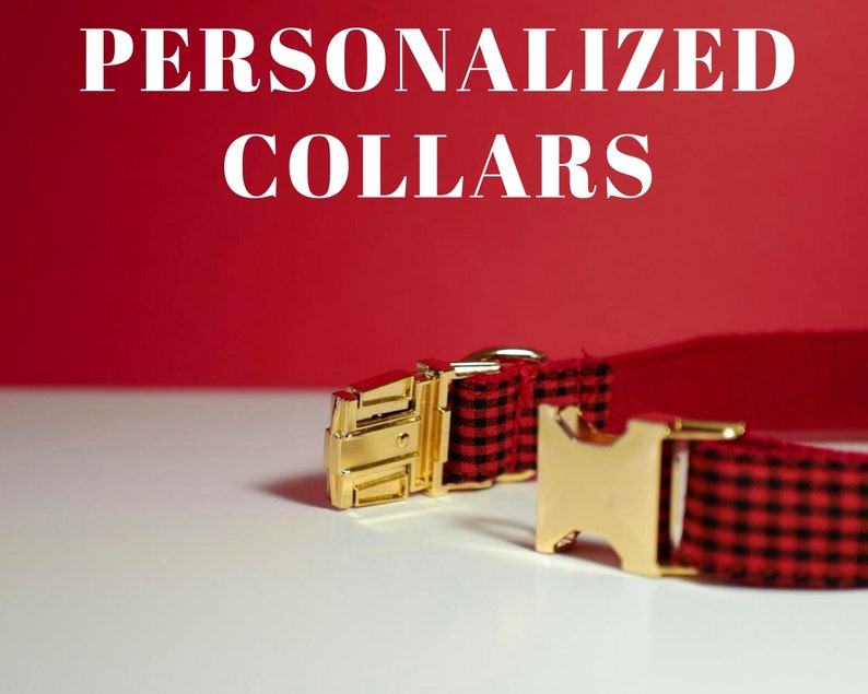 May include: Personalized red and black plaid dog collar with a gold metal buckle.