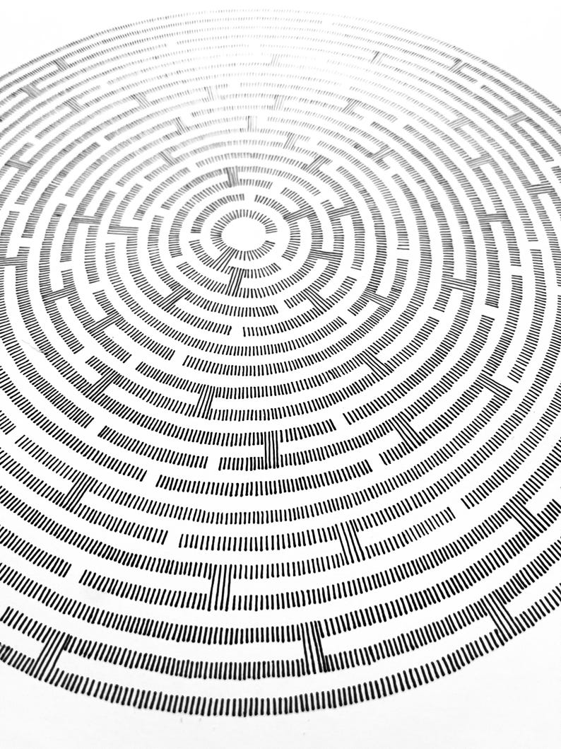 May include: A circular maze illustration composed of numerous short, vertical black ink lines arranged in concentric rings on a white background. The pattern creates a complex path structure with a clear centre point and radiating circular walls.