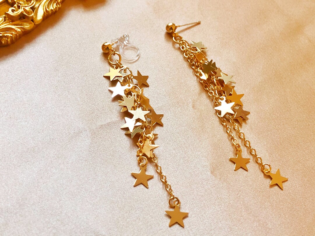 Gold dangle star earrings new arrivals
