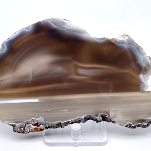 Beautiful Water Line Agate slice displaying unique horizontal banding or “waterline banding and lovely translucency. From Brazil