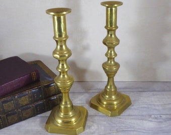 Vintage brass candlesticks, sold as a pair. Brass candle holders