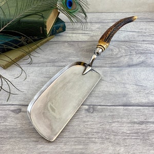 Vintage silver plated crumb scoop / lacquered handle, likely antler or horn / made by John Sanderson and Son, Sheffield