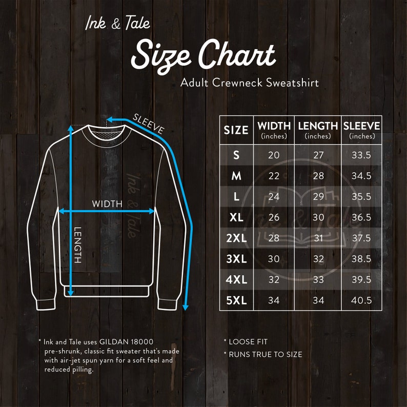 May include: Size chart for an adult crewneck sweatshirt. The chart shows the width, length, and sleeve length in inches for sizes S through 5XL. The chart is on a woodgrain background.