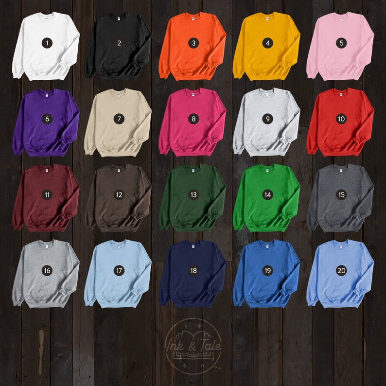 May include: Twenty different color crew neck sweatshirts, numbered 1 through 20. The sweatshirts are arranged in a grid of four rows and five columns. The sweatshirts are all the same style and size.