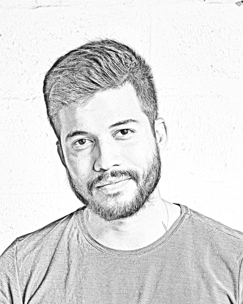 May include: A black and white sketch of a man with short, styled hair and a beard. He is wearing a plain, dark grey t-shirt.