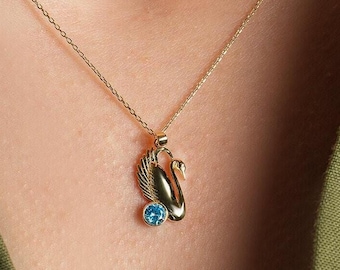 14K Gold Swan Necklace W/ Blue Topaz