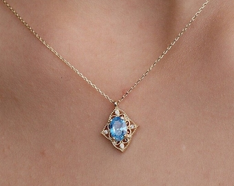 14K Gold Aquamarine Oval Shaped Necklace