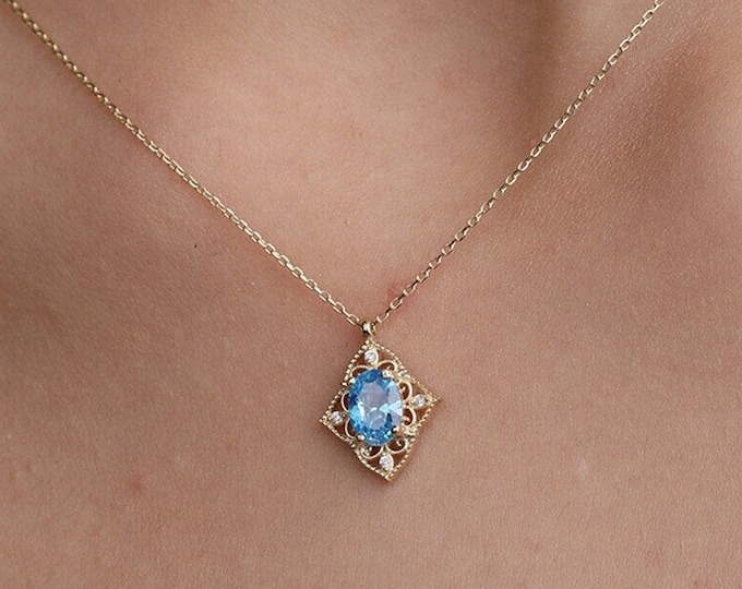 14K Gold Aquamarine Oval Shaped Necklace