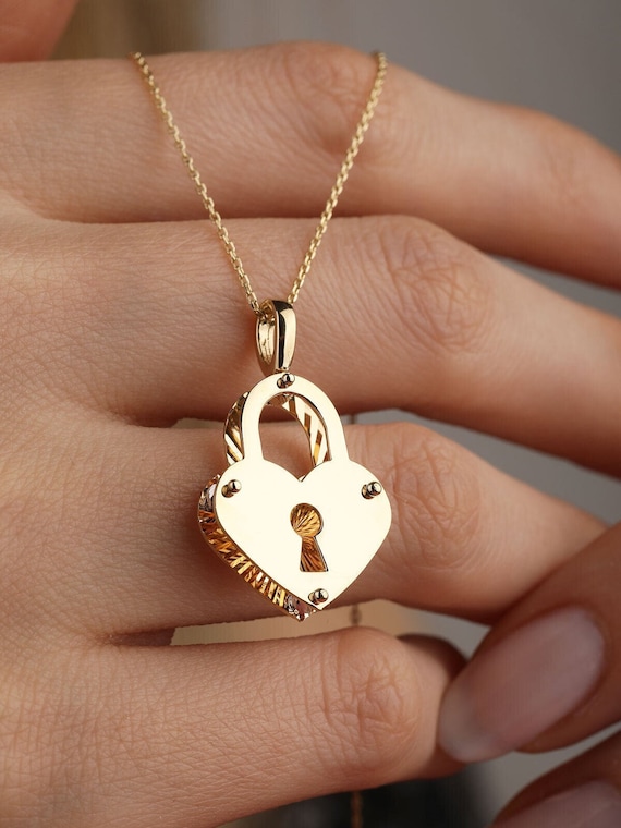 Solid gold lock pendant outlet