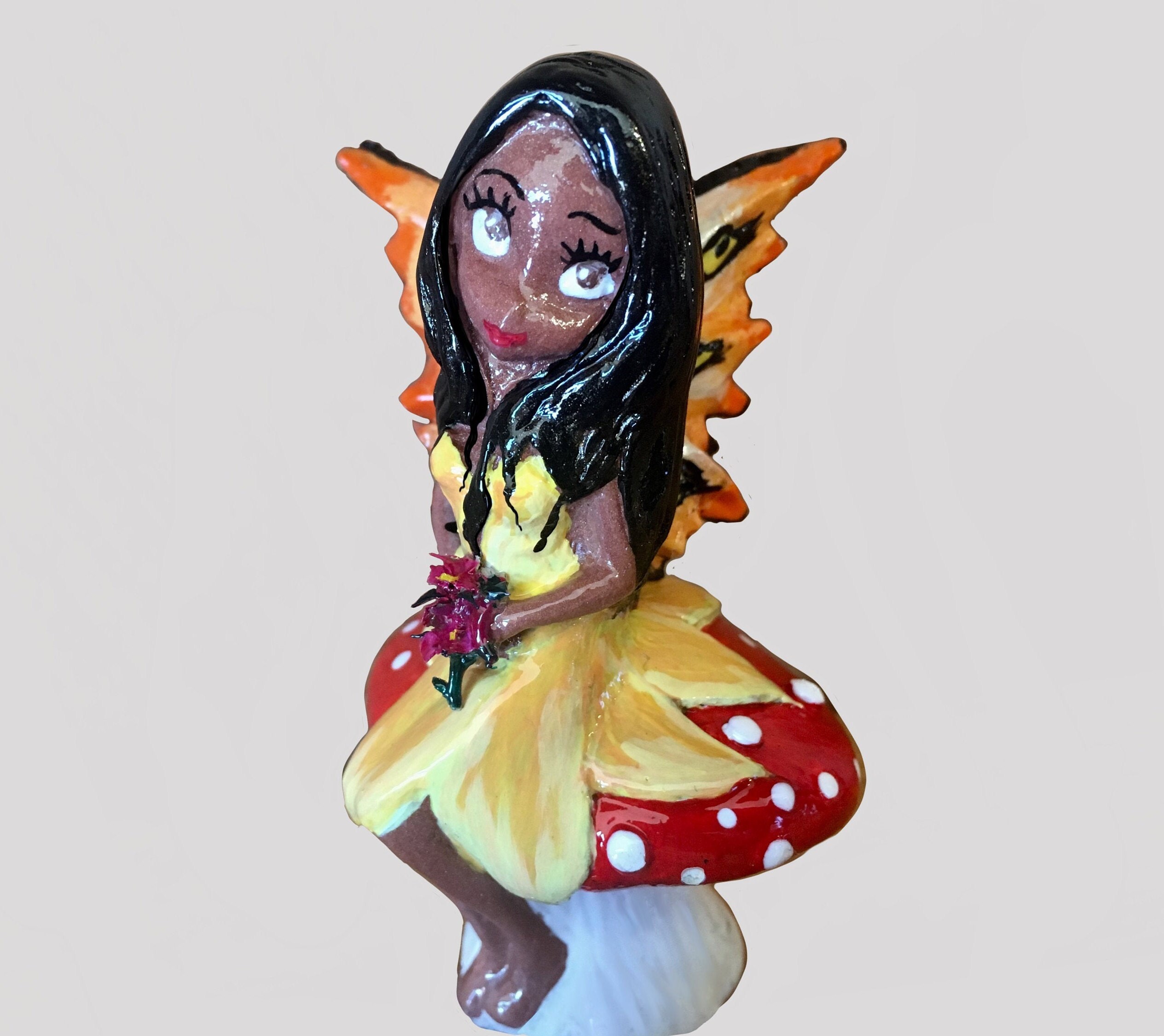 fairy with lantern statue