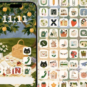 May include: A digital smartphone screen display featuring a picnic-themed wallpaper with a wicker basket, apples, and a rabbit, overlaid with a grid of custom app icons including a black cat, strawberry, and various nature-inspired illustrations.