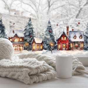 以下が含まれることがあります： 雪に覆われた家と常緑樹の水彩画が描かれた、居心地の良い冬のシーン。白い毛糸玉、ニットのスカーフ、白いマグカップ、編み棒が窓枠に置かれています。暖かさと快適さを感じさせるシーンです。